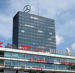 Europa Centre in Berlin Germany uses a Volkwagen engine to rotate the Mercedes Benz Start on it's roof top.